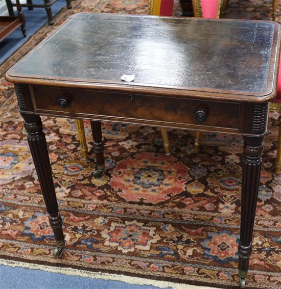 A Victorian mahogany small writing table, with leather inset top and frieze drawer, on turned and tapered legs W.74cm